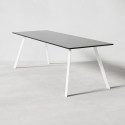 Konferensbord med svart laminatskiva och vitt metallunderrede med två utställda benpar. 90 centimeter högt. Konferensbord med svart laminatskiva och vitt metallunderrede med två utställda benpar. 90 centimeter högt.